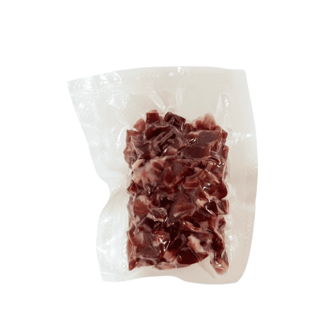 Taquitos de Jamón Ibérico, envasados al vacío, paquete de 100g con sabor auténtico y versatilidad culinaria.